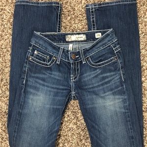 Boot cut denim jeans.